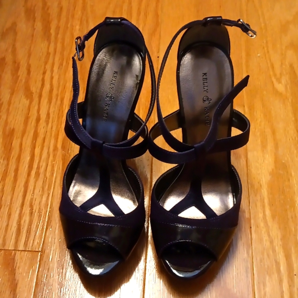 Purple high heeled open toed shoes